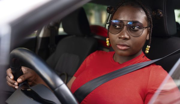 medium-shot-woman-posing-car